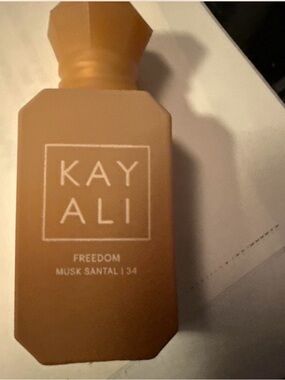 KAYALI Freedom Musk Santal 34 Body Fragrance - Tan Bottle